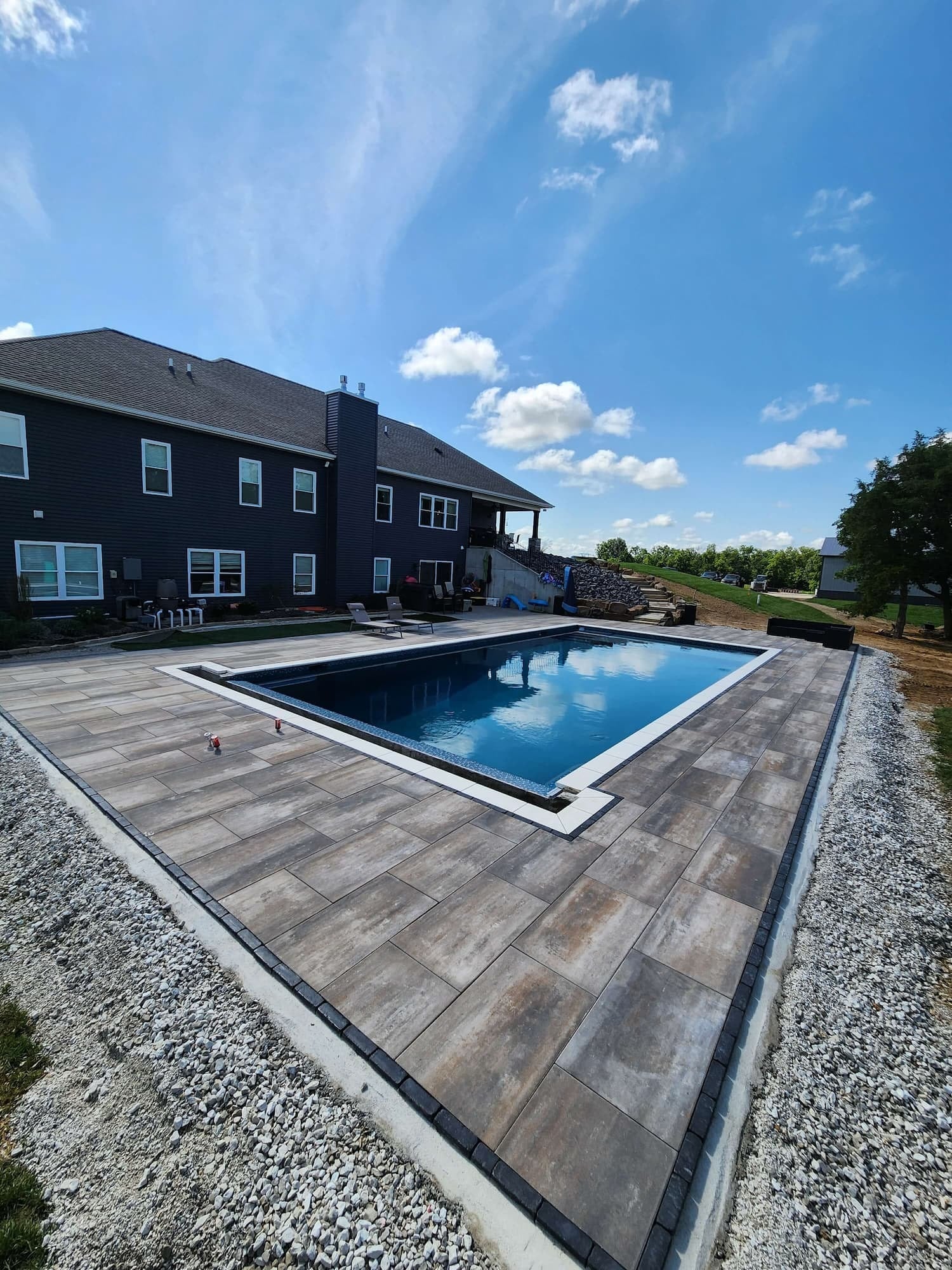 Outdoor Pool Surrounded by Tile